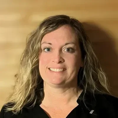 A headshot photo of Christa Bliss